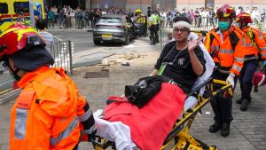 9 injured as car mounts pavement in Hong Kong